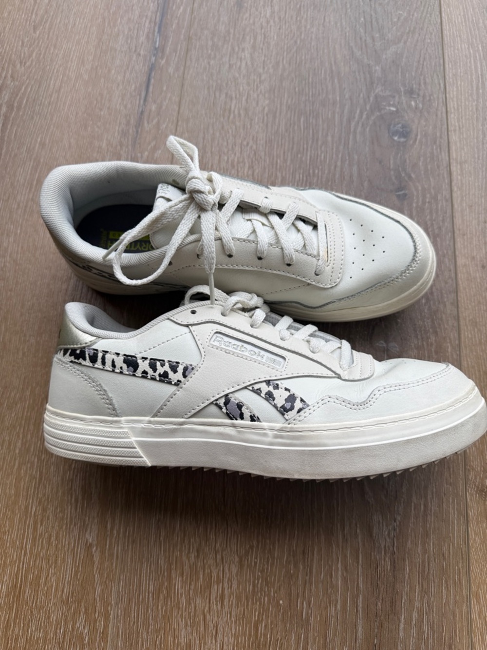 Reebok Off-White Leather Sneakers with Black, White & Purple Animal Accent